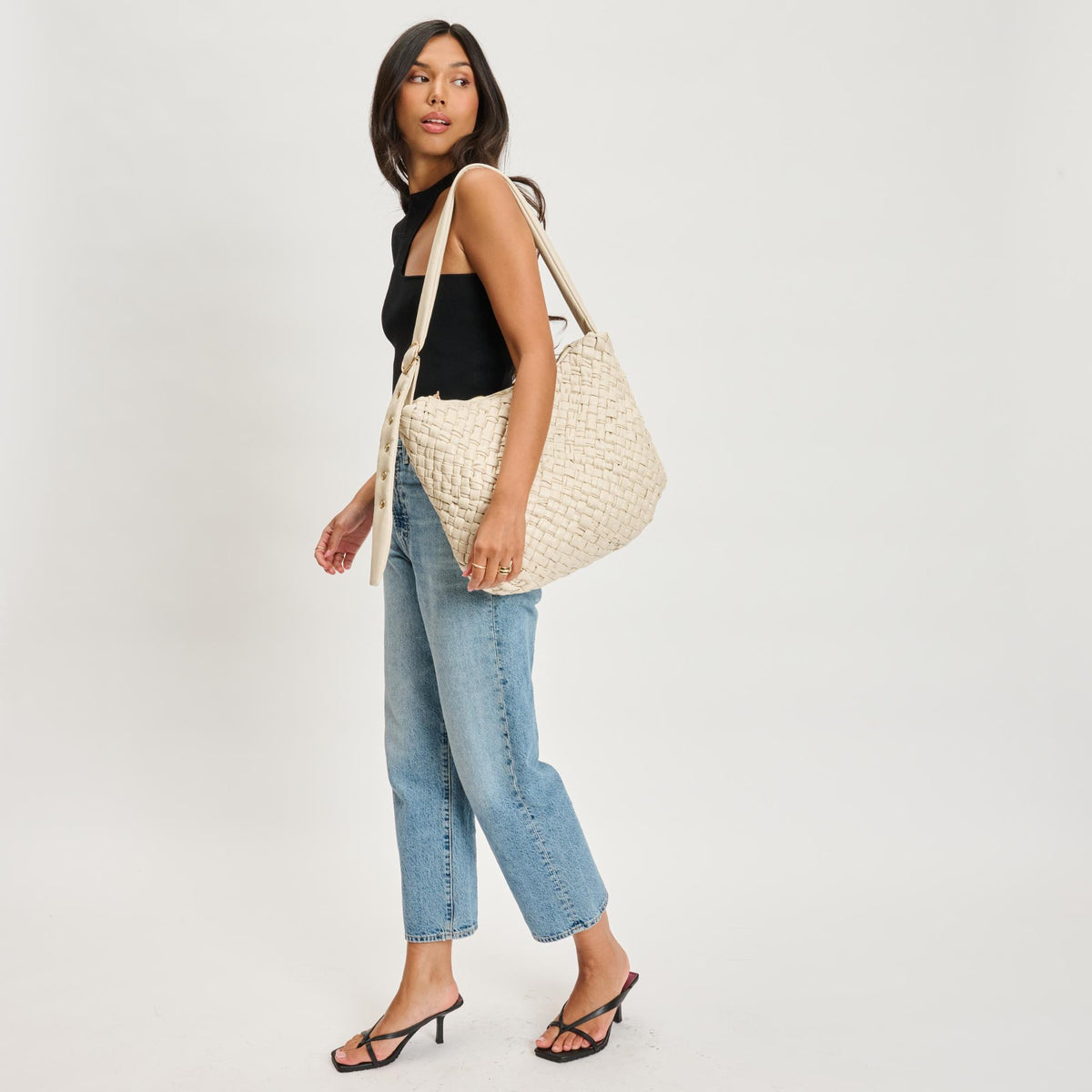 Woman wearing Oatmilk Moda Luxe Classica Crossbody 842017135494 View 3 | Oatmilk