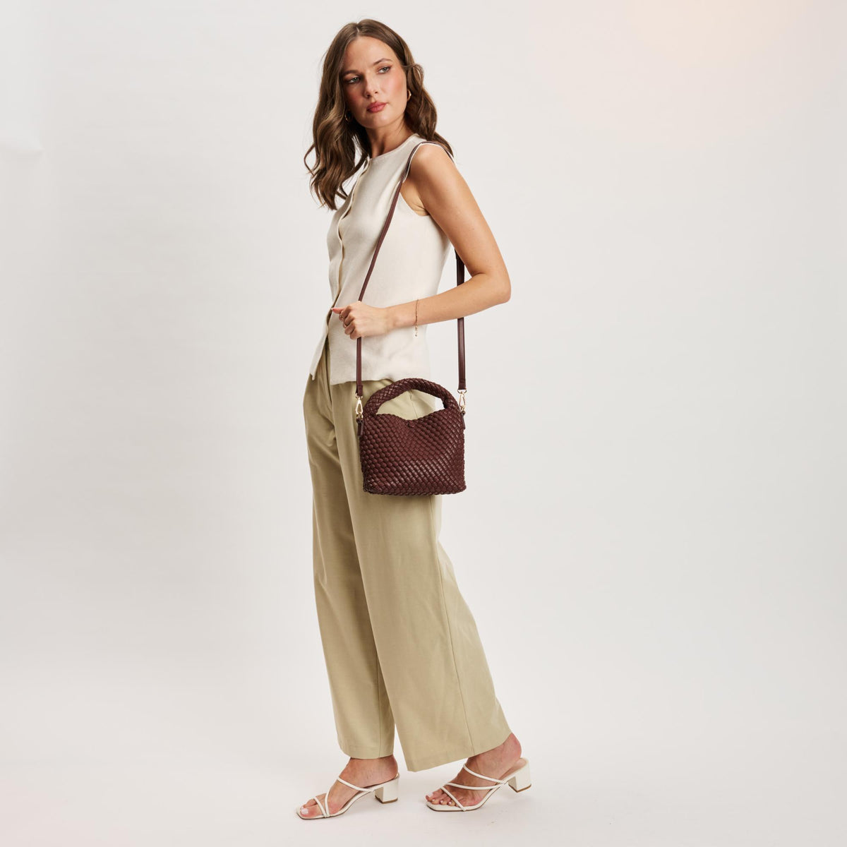 Woman wearing Chocolate Moda Luxe Jessamine Crossbody 842017141327 View 3 | Chocolate