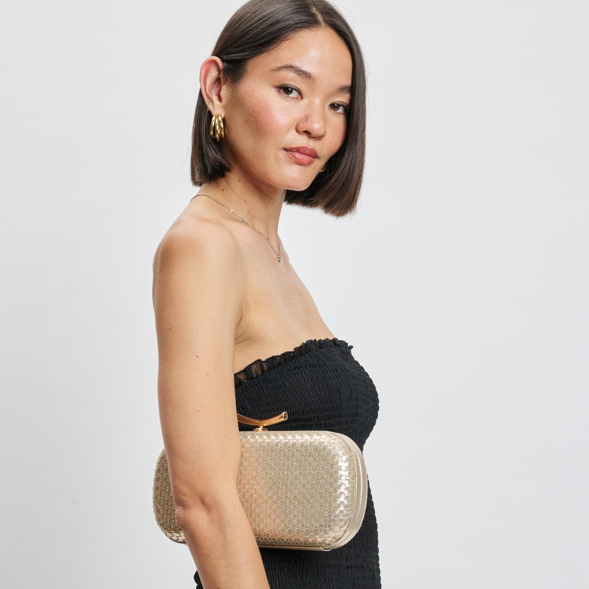 Woman wearing Gold Moda Luxe Victoria Evening Bag 842017139461 View 3 | Gold