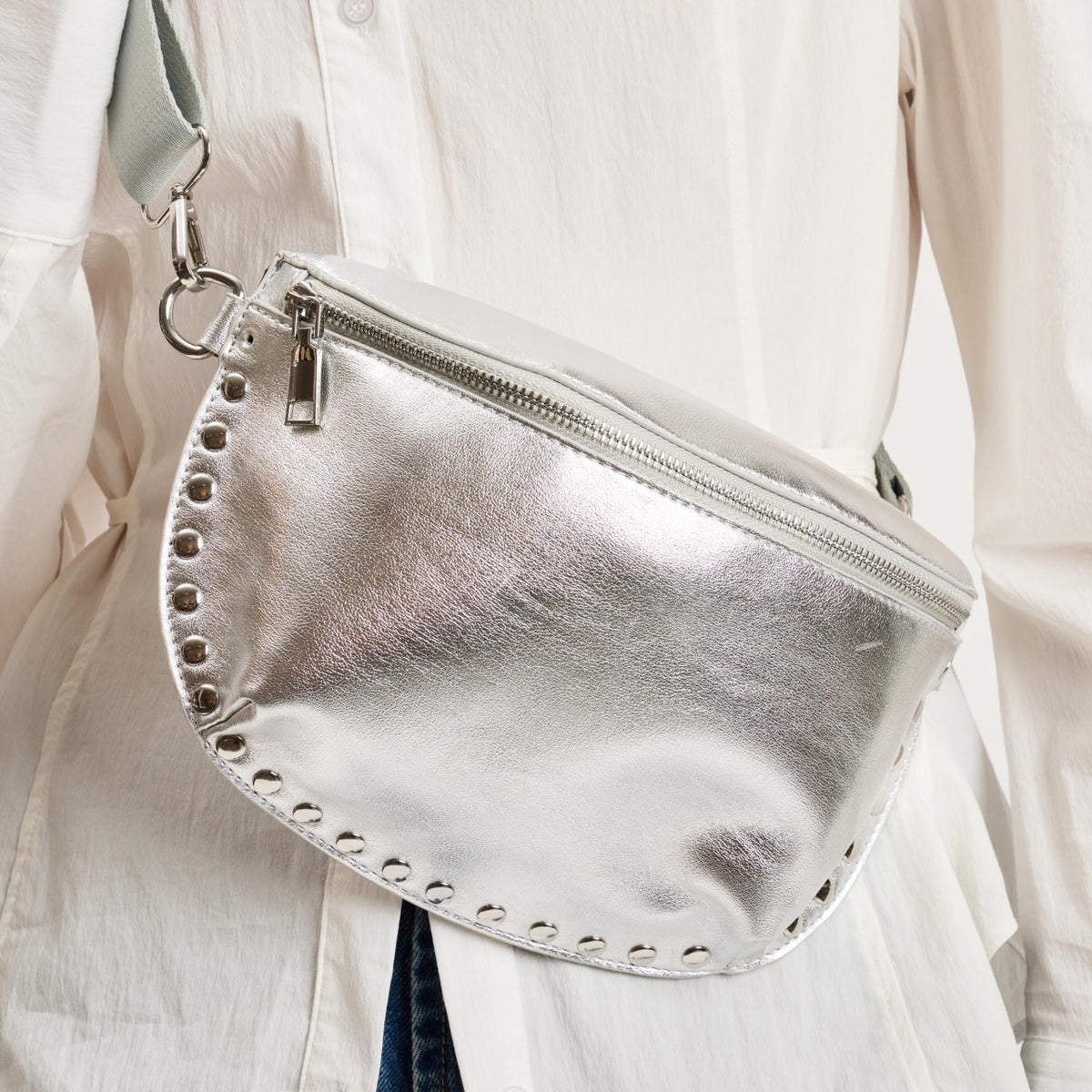 Woman wearing Silver Moda Luxe Gizelle - Metallic Belt Bag 842017141488 View 2 | Silver