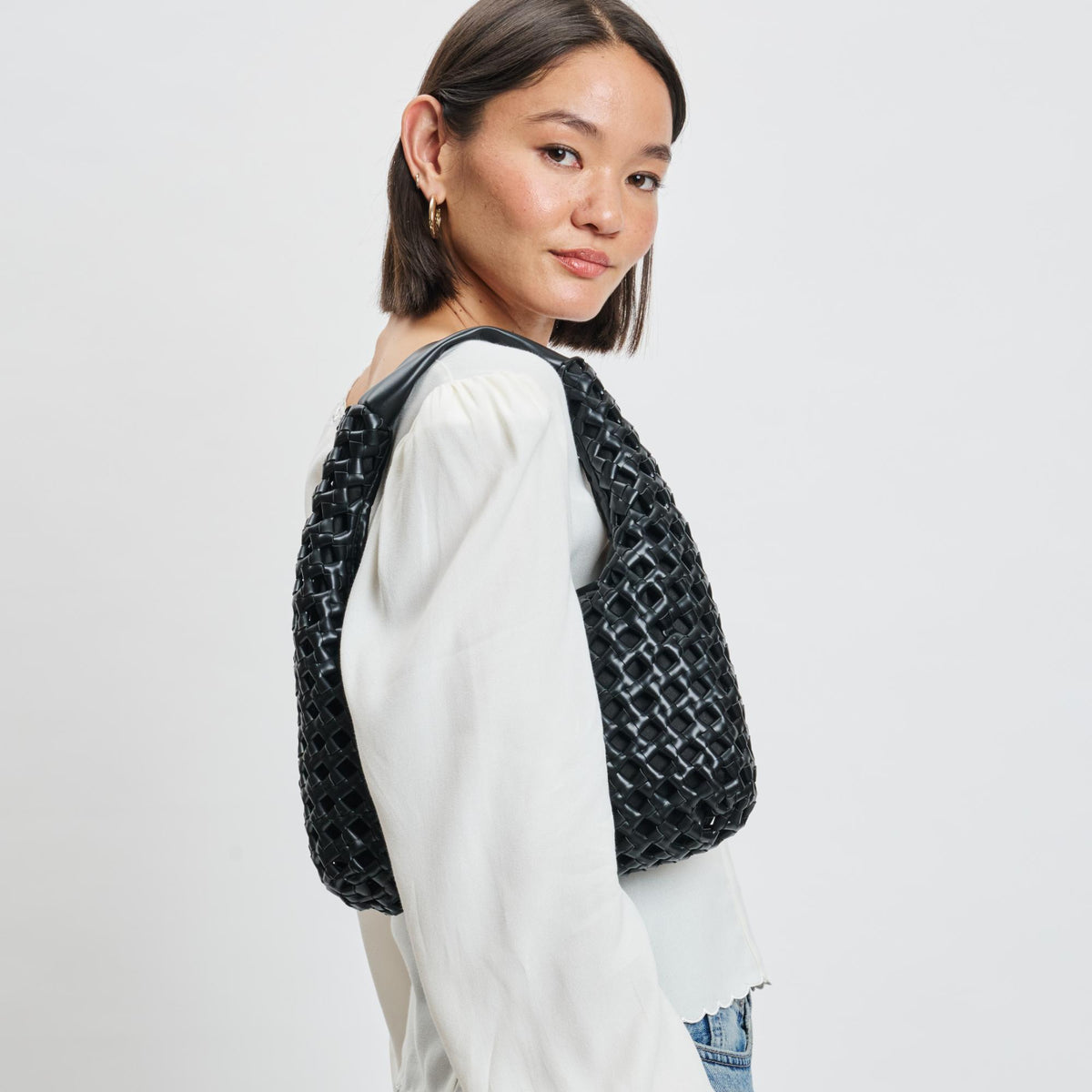 Woman wearing Black Moda Luxe Richelle Hobo 842017137511 View 2 | Black