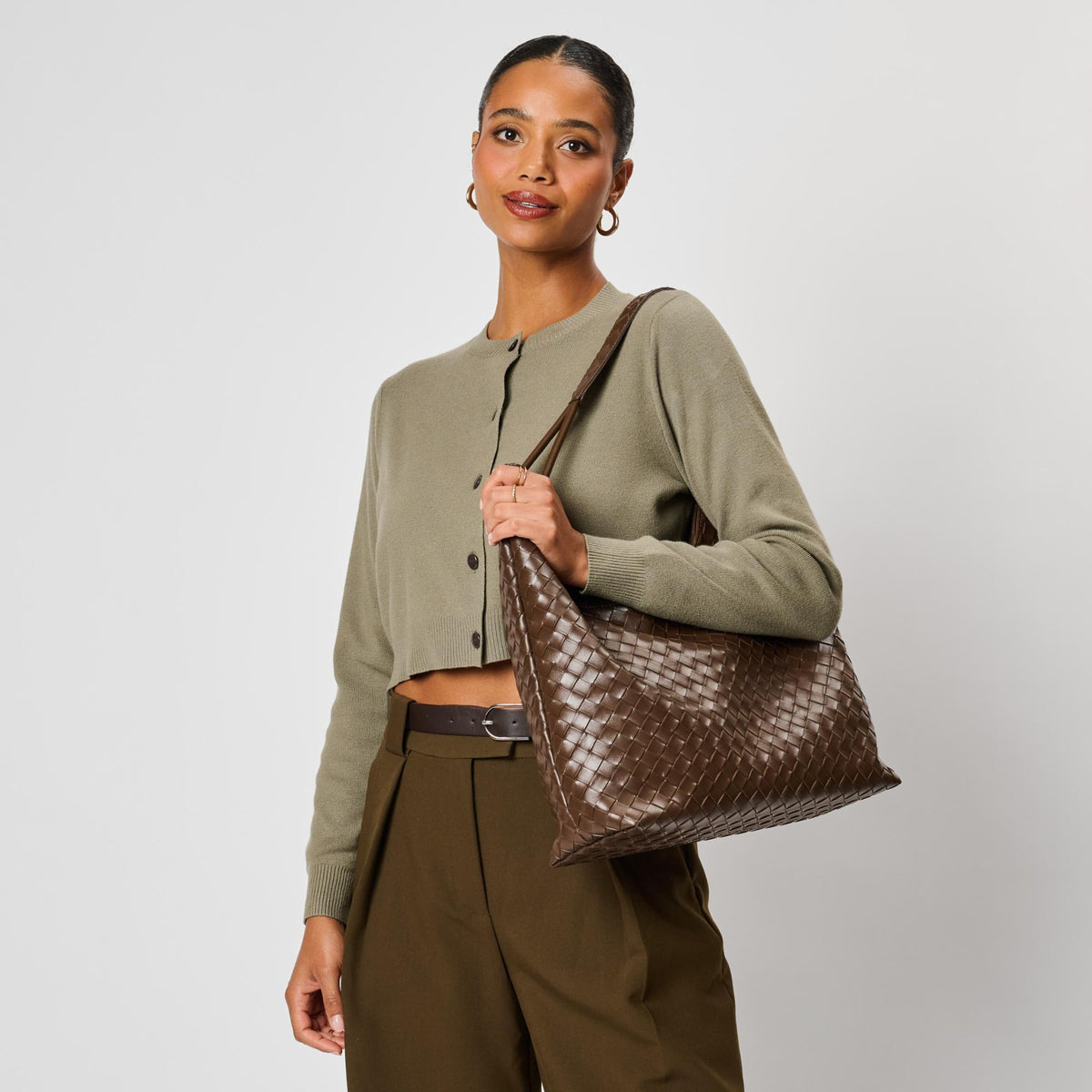 Woman wearing Chocolate Moda Luxe Ezia Hobo 842017142751 View 1 | Chocolate