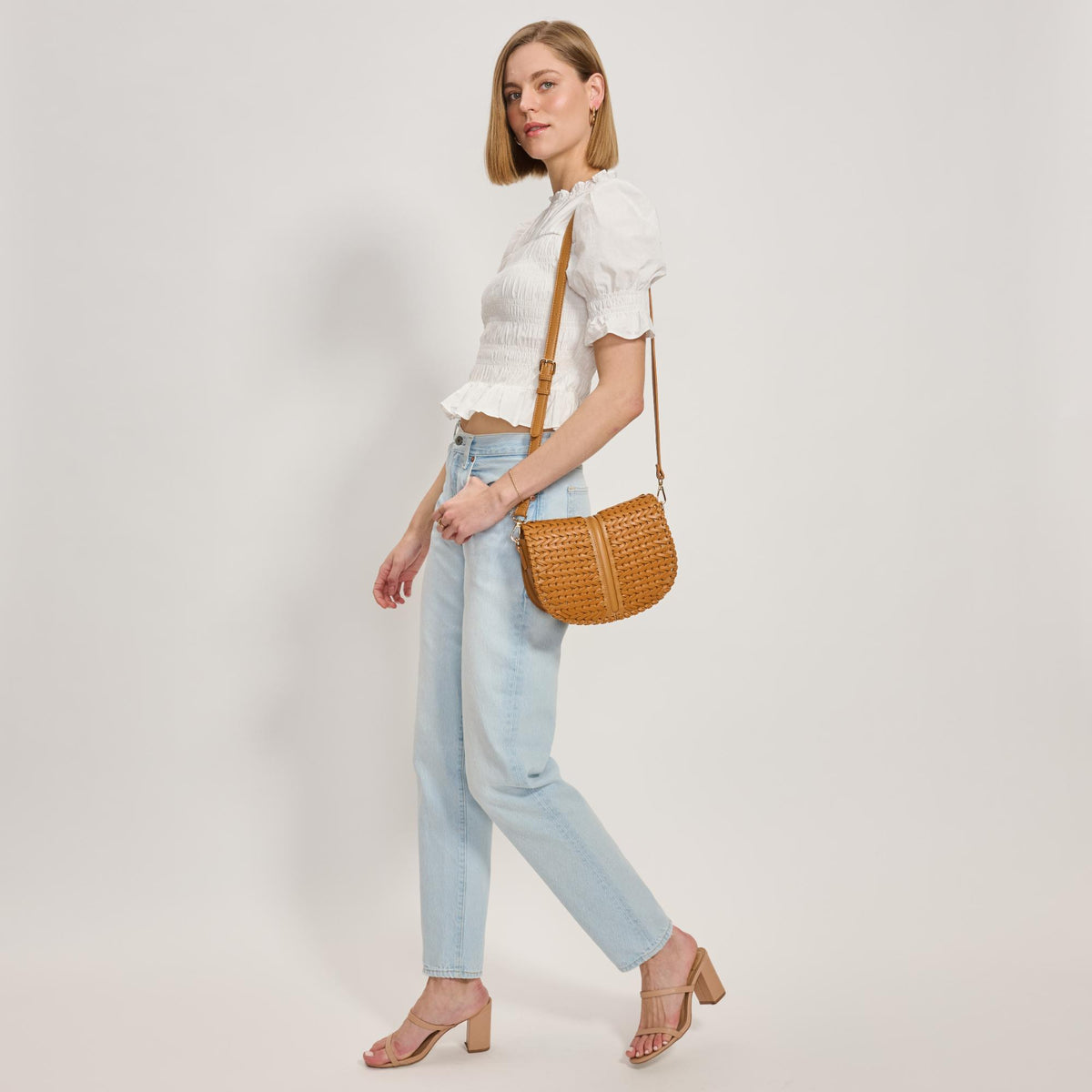 Woman wearing Tan Moda Luxe Cecillia Crossbody 842017137702 View 3 | Tan