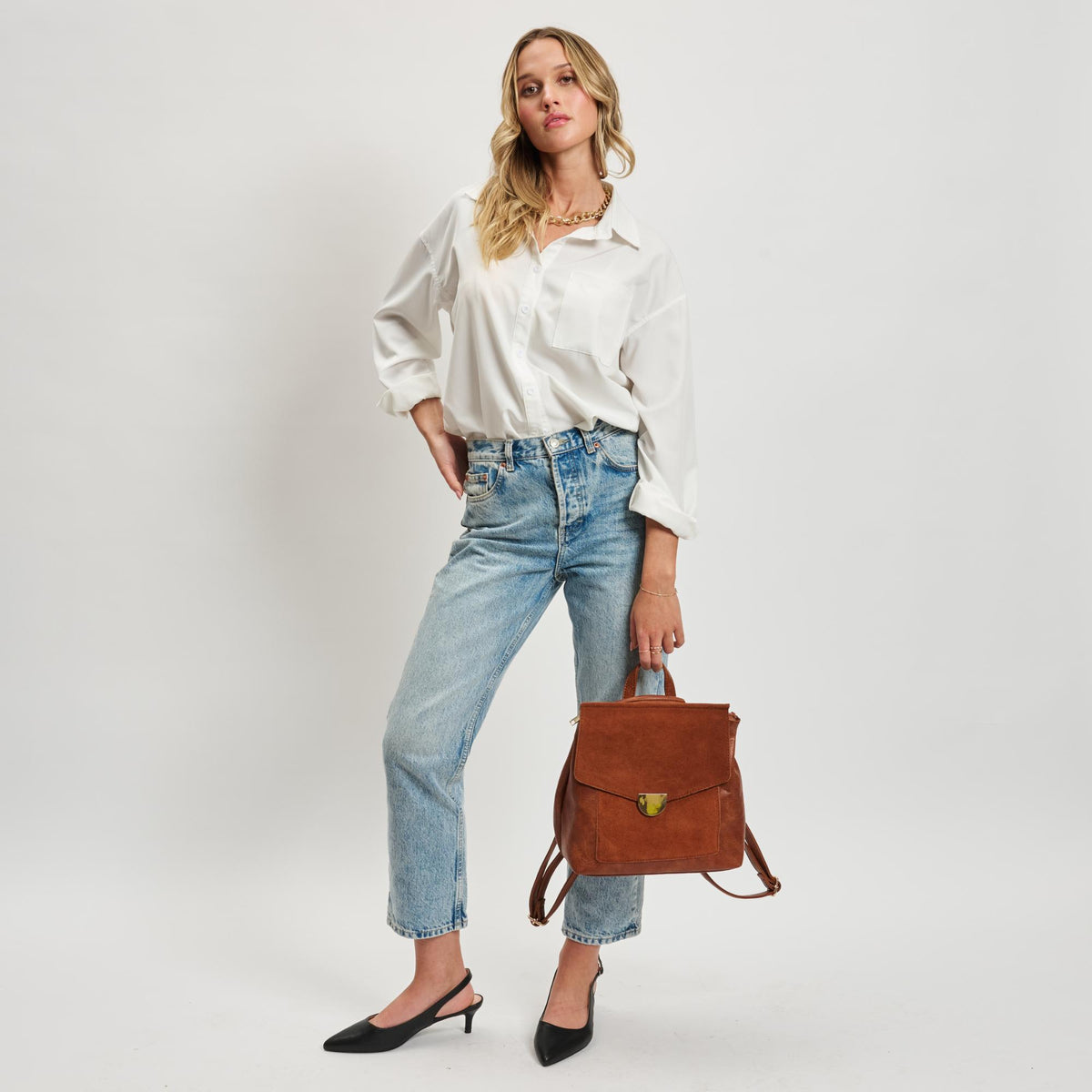 Woman wearing Tan Moda Luxe Lynn Backpack 842017119456 View 4 | Tan