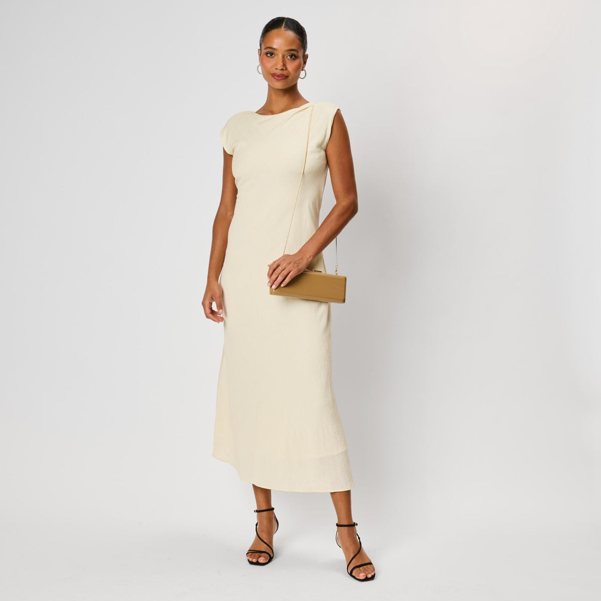 Woman wearing Camel Moda Luxe Angie Clutch 842017142492 View 4 | Camel