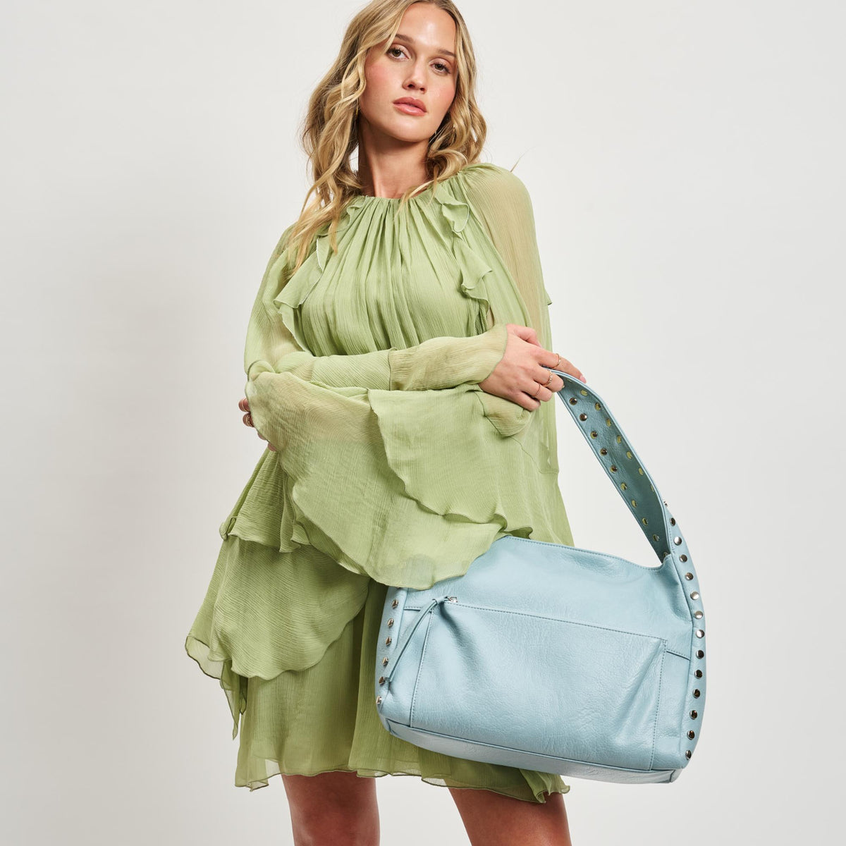 Woman wearing Ice Blue Sol and Selene Misty Hobo 842017137207 View 2 | Ice Blue