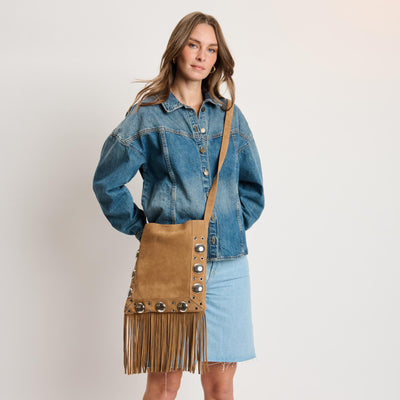 Woman wearing Cognac Moda Luxe Courtney Crossbody 842017140559 View 1 | Cognac