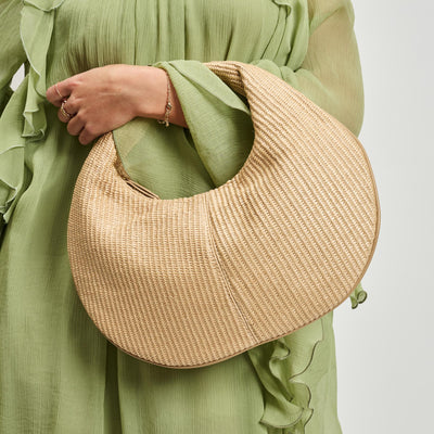 Woman wearing Natural Sol and Selene Farrah - Straw Hobo 842017138662 View 1 | Natural