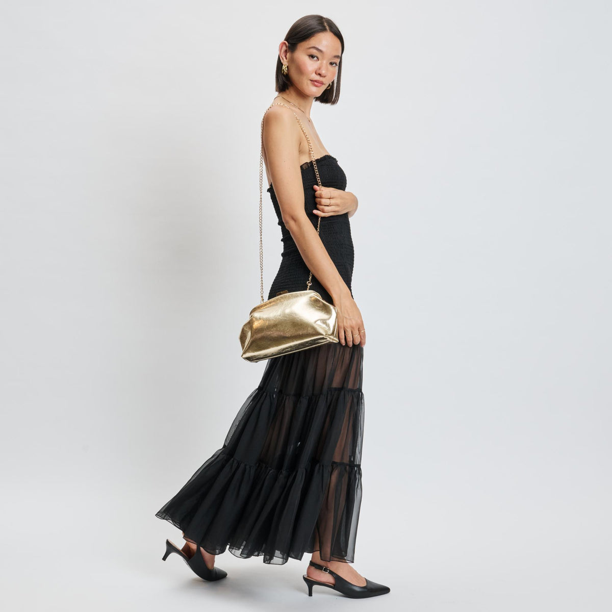 Woman wearing Gold Moda Luxe Camille Clutch 842017139195 View 4 | Gold