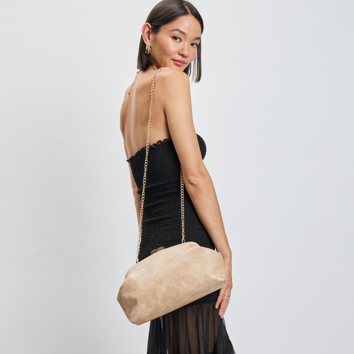 Woman wearing Natural Moda Luxe Camille Clutch 842017139171 View 2 | Natural