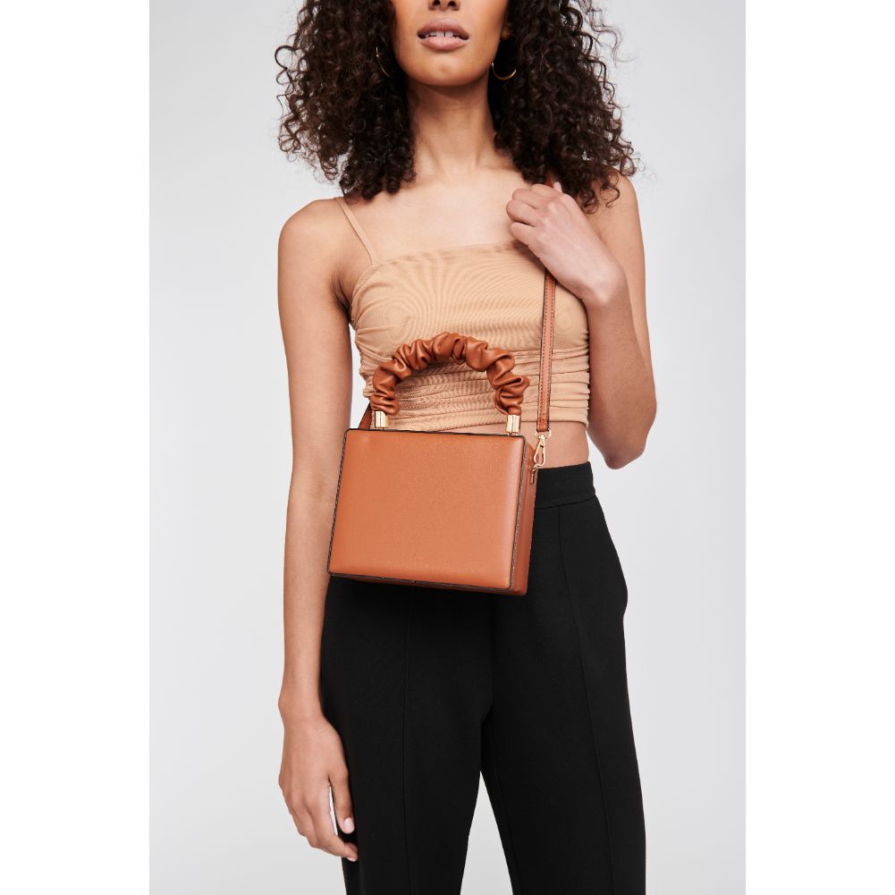Woman wearing Tan Moda Luxe Kaia Crossbody 842017126140 View 1 | Tan