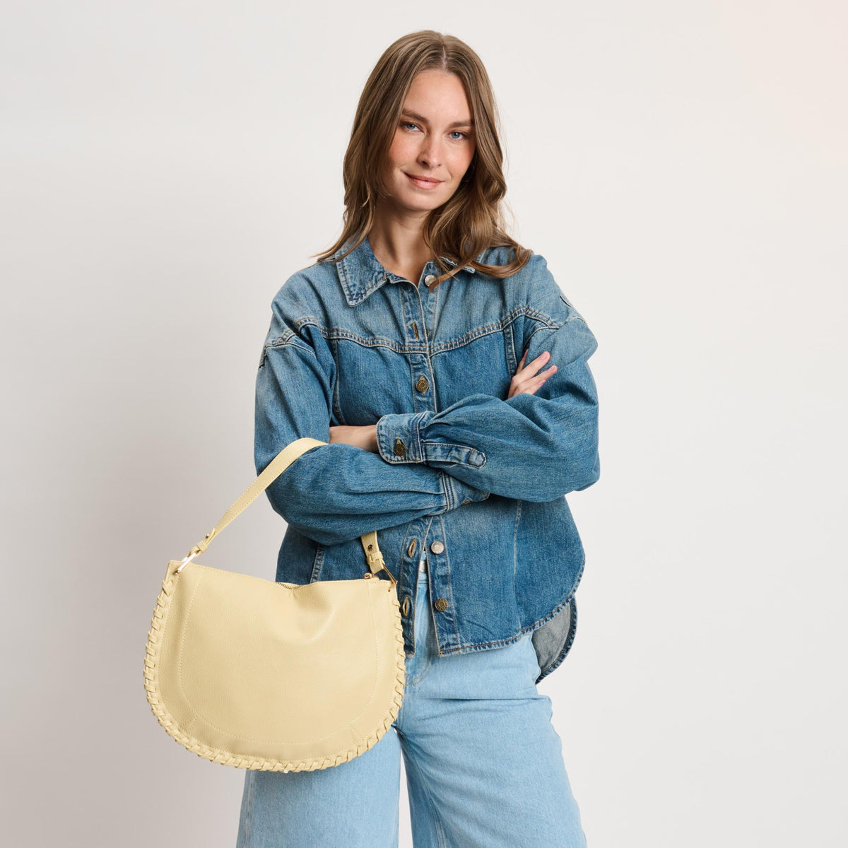 Woman wearing Butter Moda Luxe Lita Hobo 842017141099 View 4 | Butter