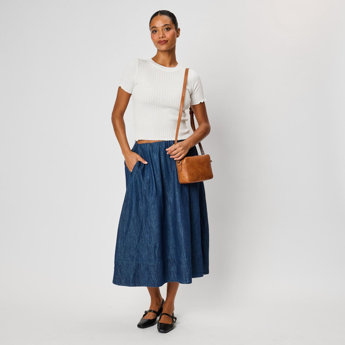 Woman wearing Tan Moda Luxe Skylie Crossbody 842017126706 View 4 | Tan