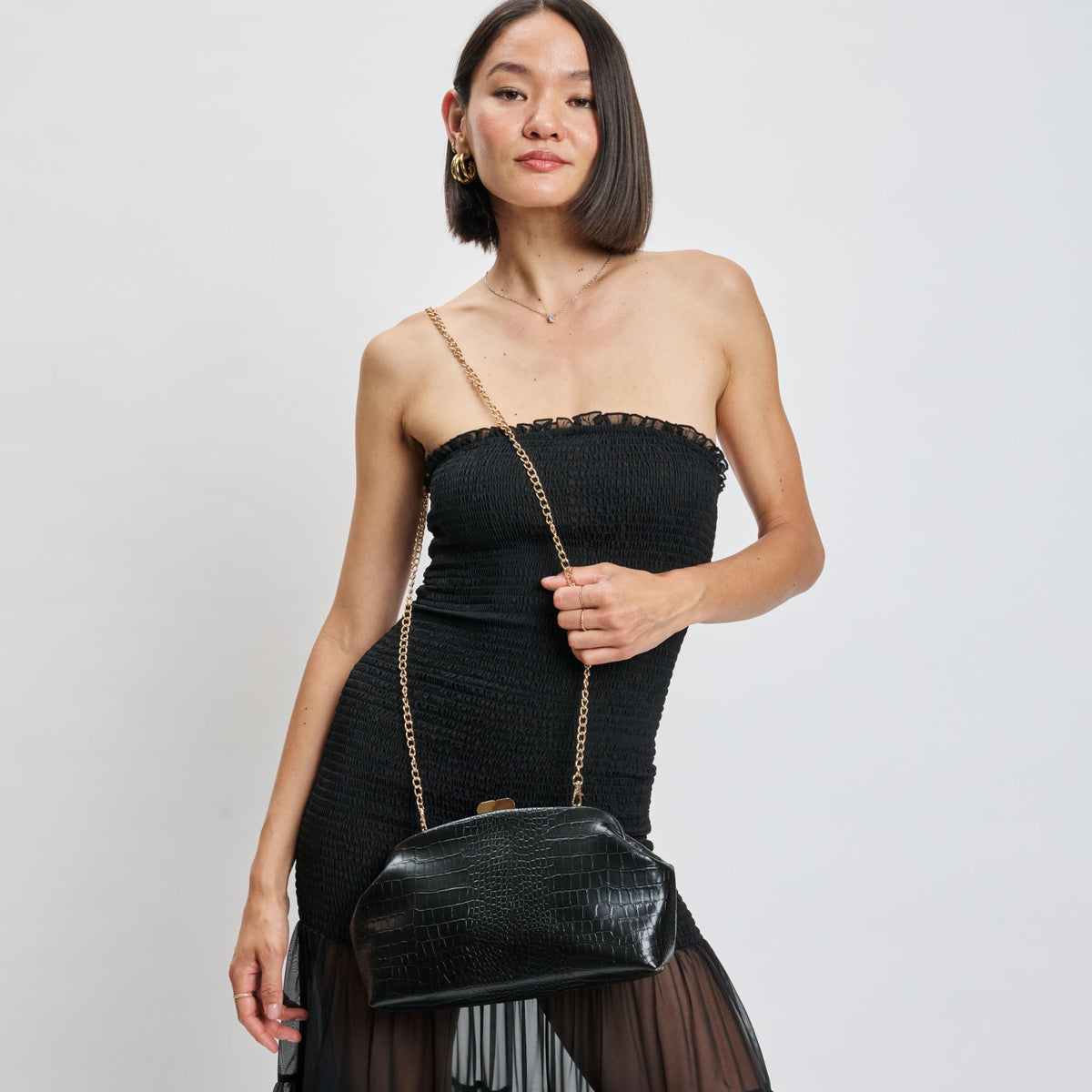 Woman wearing Black Moda Luxe Camille Clutch 842017139164 View 3 | Black