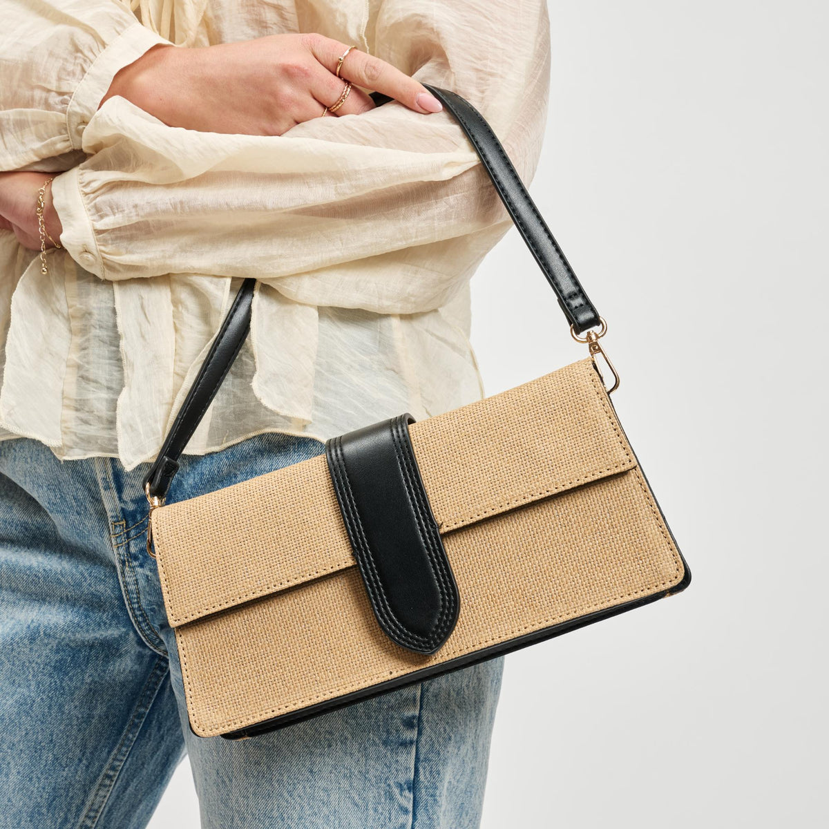 Woman wearing Natural Black Moda Luxe Violet - Straw Crossbody 842017142126 View 1 | Natural Black