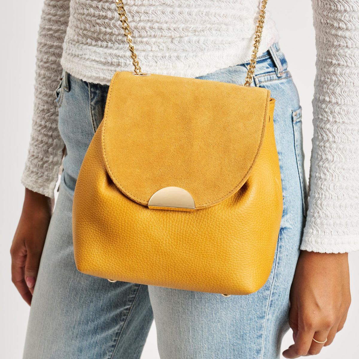 Woman wearing Mustard Moda Luxe Breanna Crossbody 842017127956 View 4 | Mustard