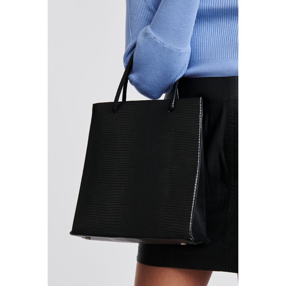 Woman wearing Black Moda Luxe Piper Tote 842017125143 View 2 | Black
