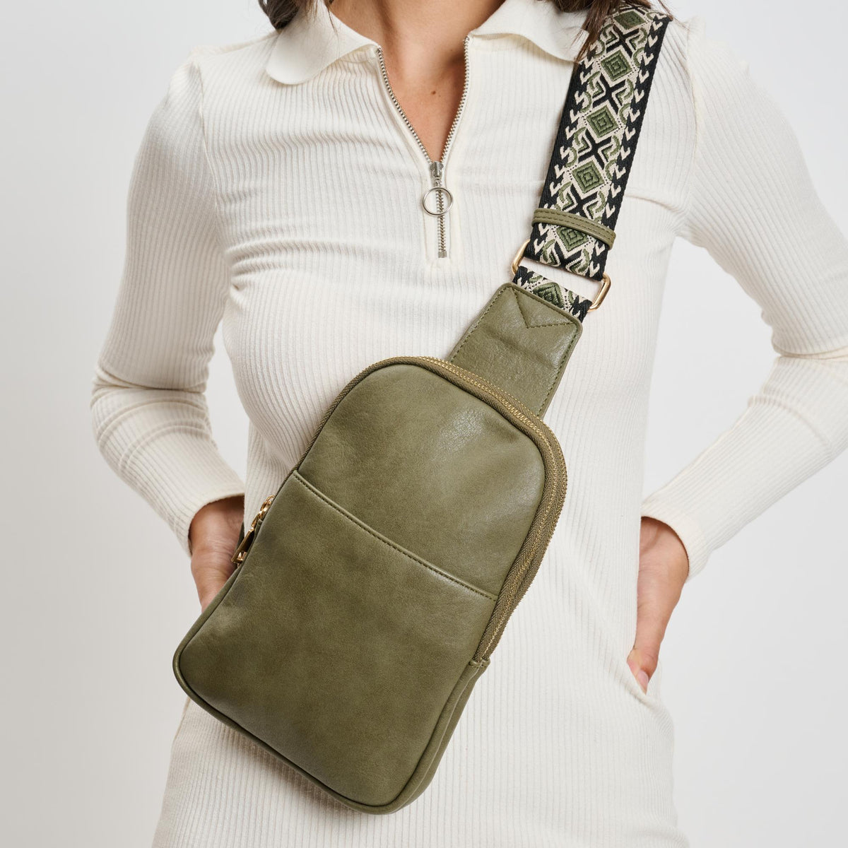 Woman wearing Olive Moda Luxe Zuri Sling Backpack 842017135883 View 1 | Olive