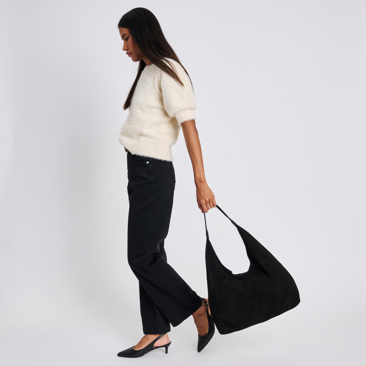 Woman wearing Black Moda Luxe Amber Hobo 842017137030 View 4 | Black