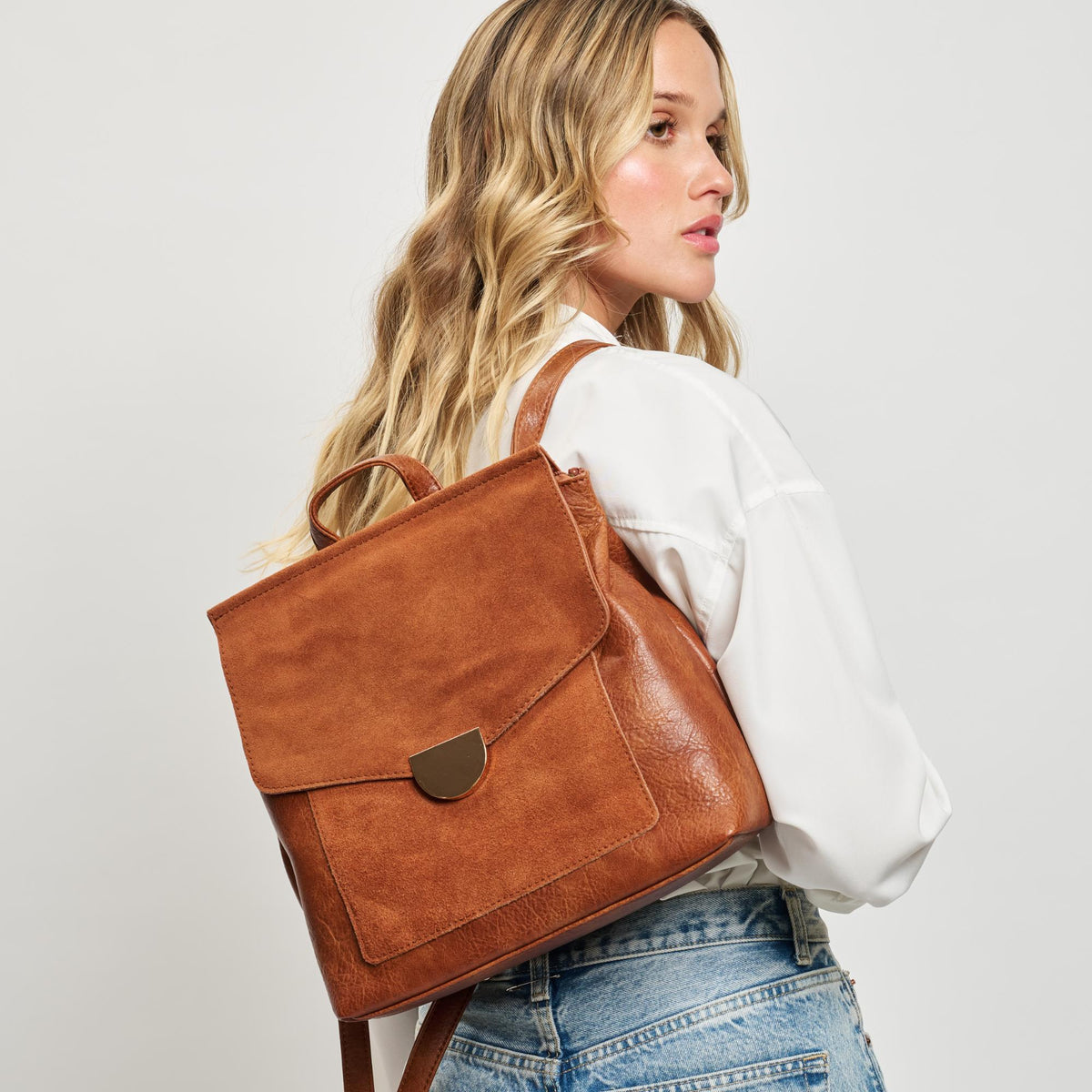 Woman wearing Tan Moda Luxe Lynn Backpack 842017119456 View 1 | Tan