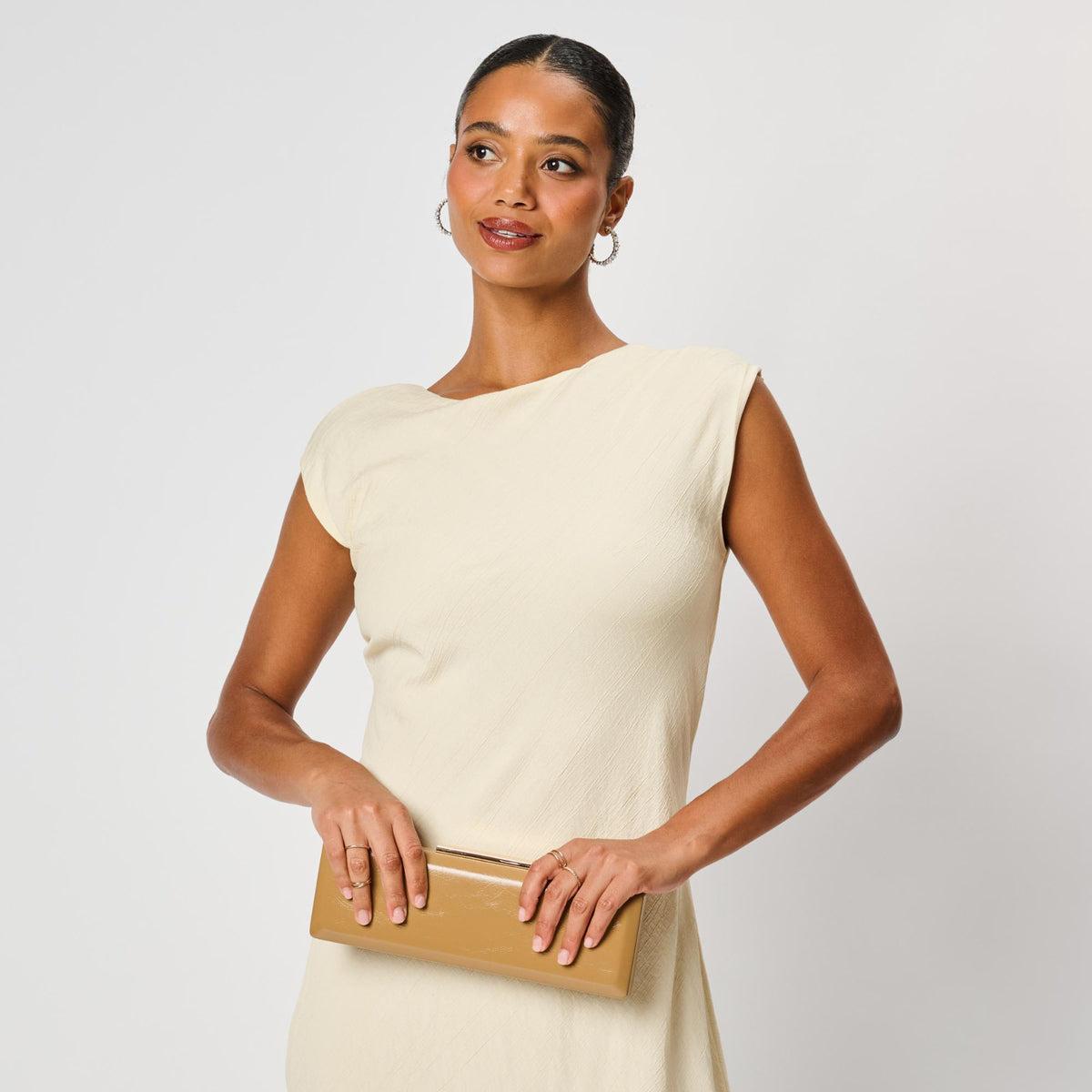 Woman wearing Camel Moda Luxe Angie Clutch 842017142492 View 3 | Camel