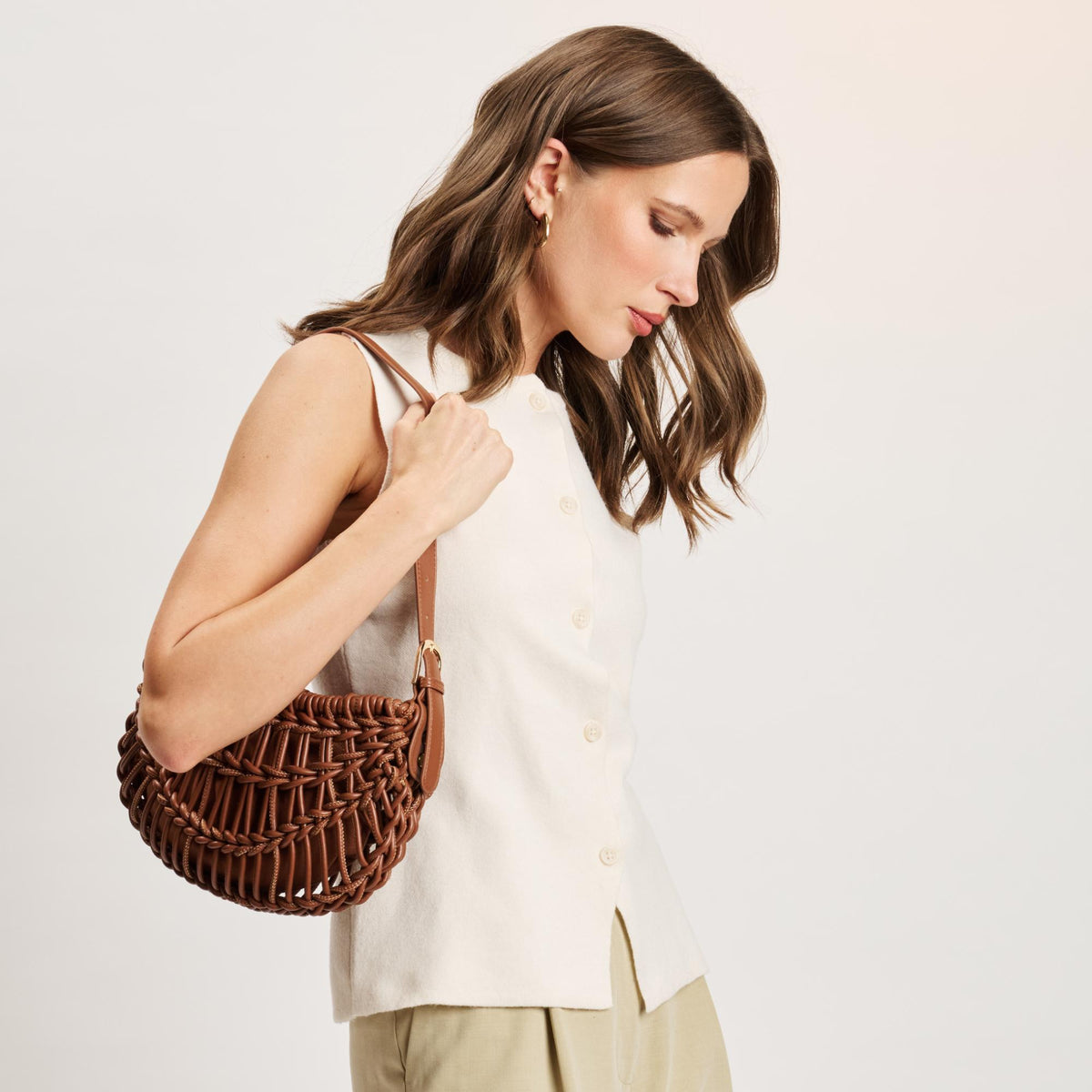 Woman wearing Cognac Moda Luxe Francesca Clutch 842017141396 View 2 | Cognac