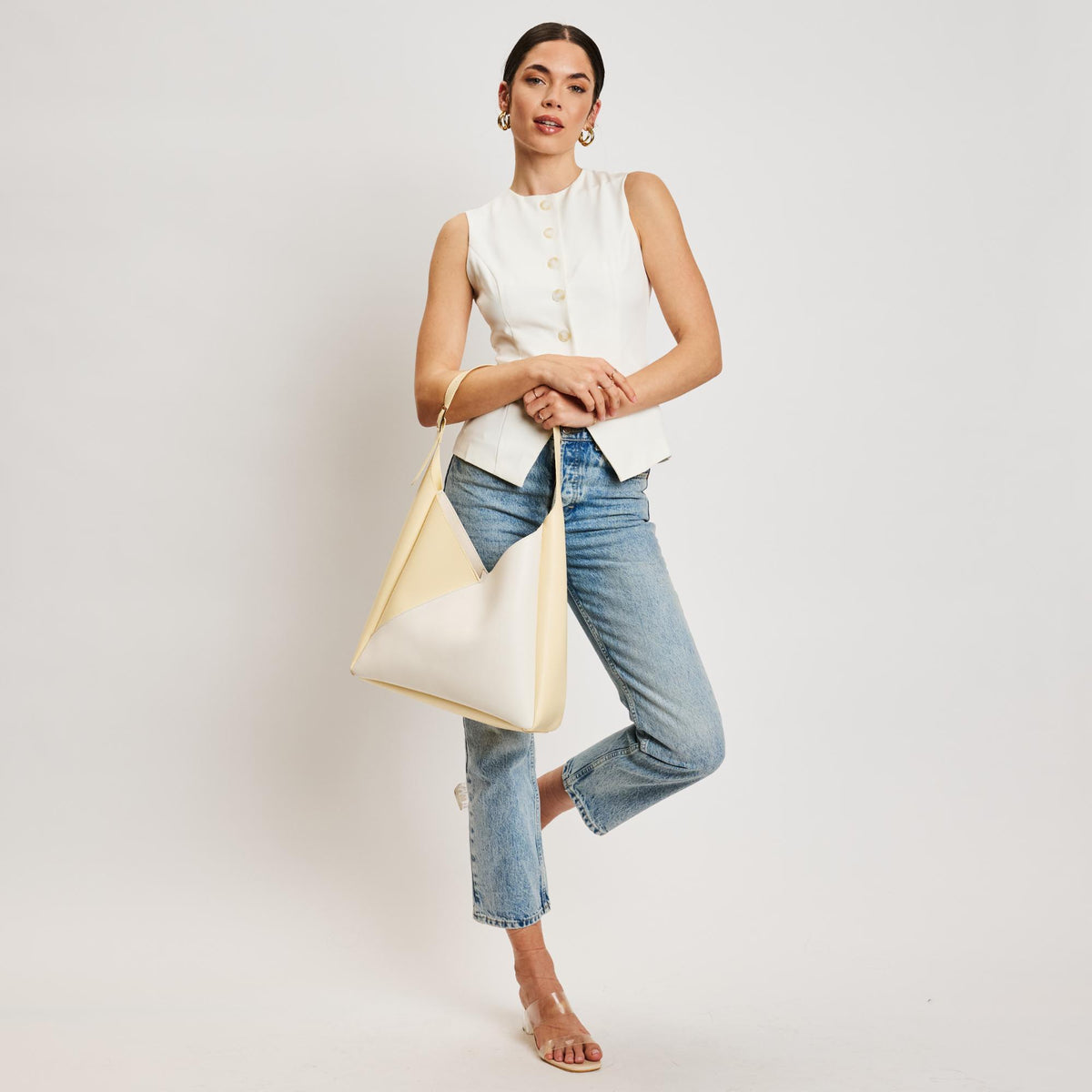Woman wearing Ivory Butter Sol and Selene Frankie Hobo 842017138549 View 4 | Ivory Butter
