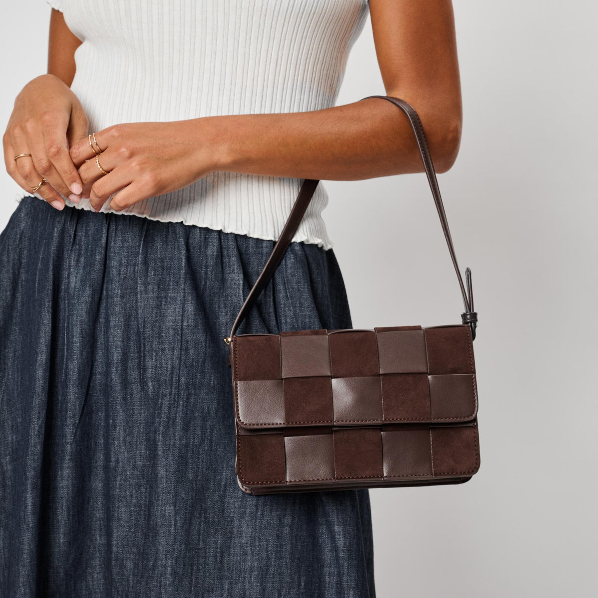 Woman wearing Chocolate Moda Luxe Tanya Crossbody 842017142904 View 1 | Chocolate