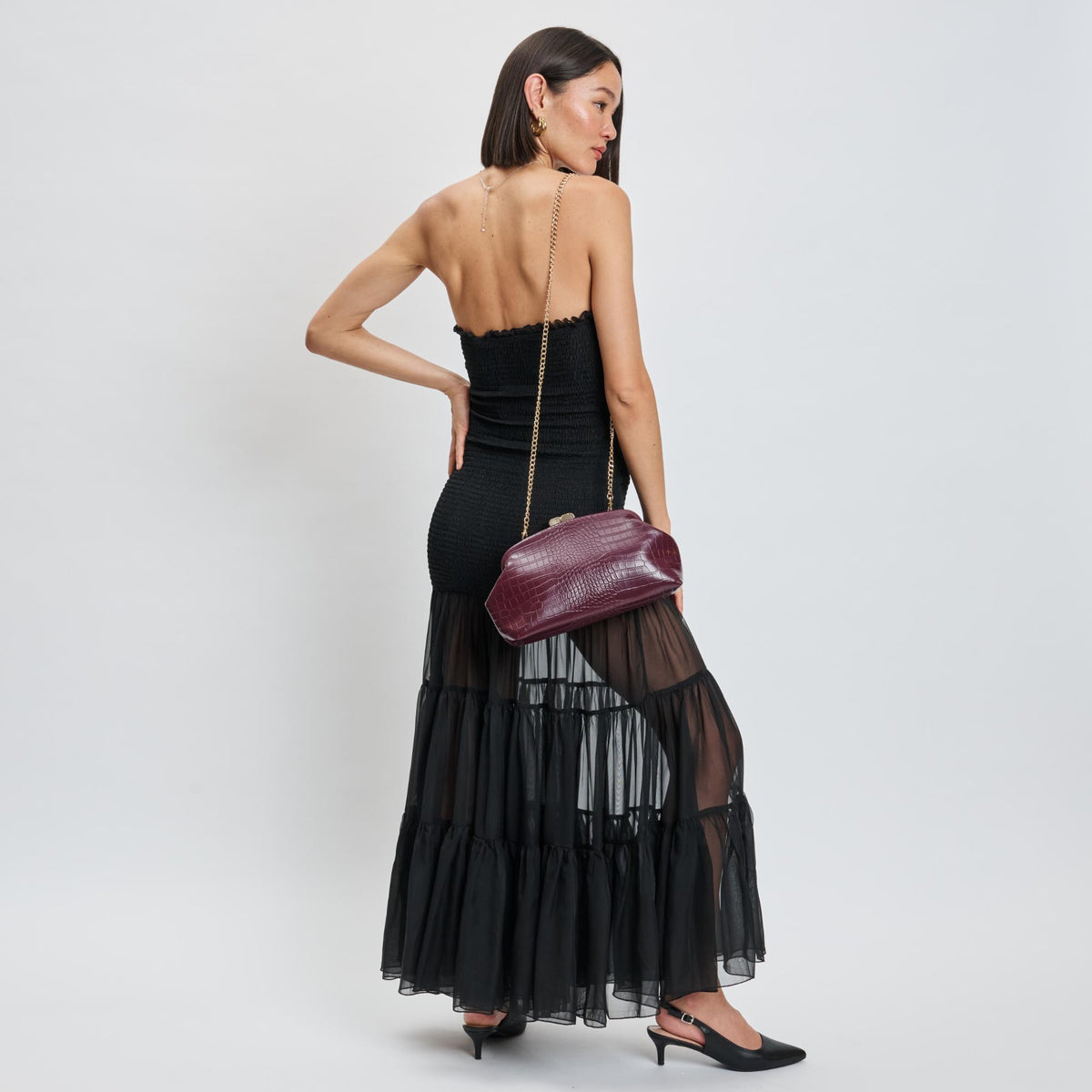 Woman wearing Burgundy Moda Luxe Camille Clutch 842017139188 View 2 | Burgundy