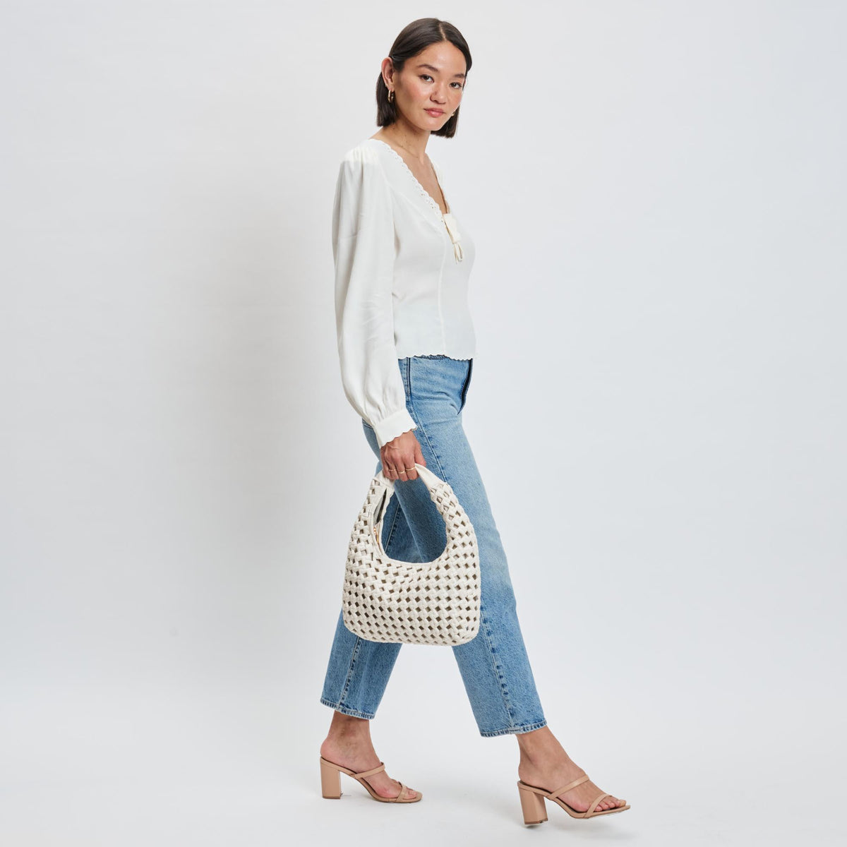 Woman wearing Oatmilk Moda Luxe Richelle Hobo 842017137528 View 3 | Oatmilk