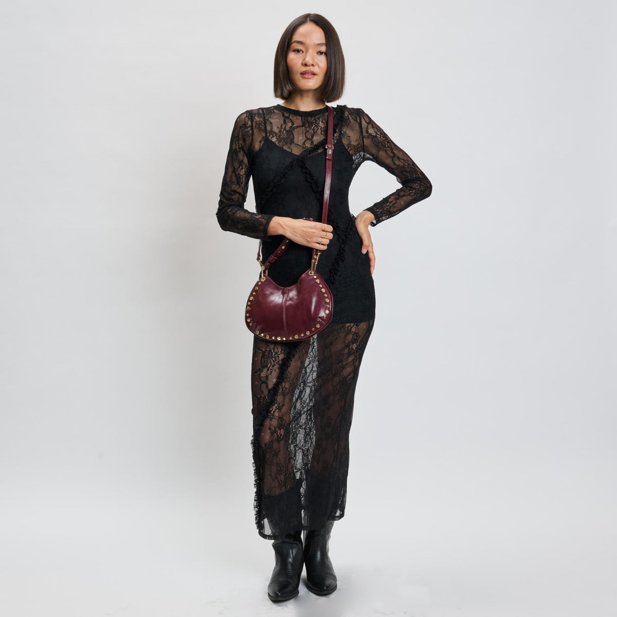 Woman wearing Wine Moda Luxe Nova Crossbody 842017139645 View 3 | Wine