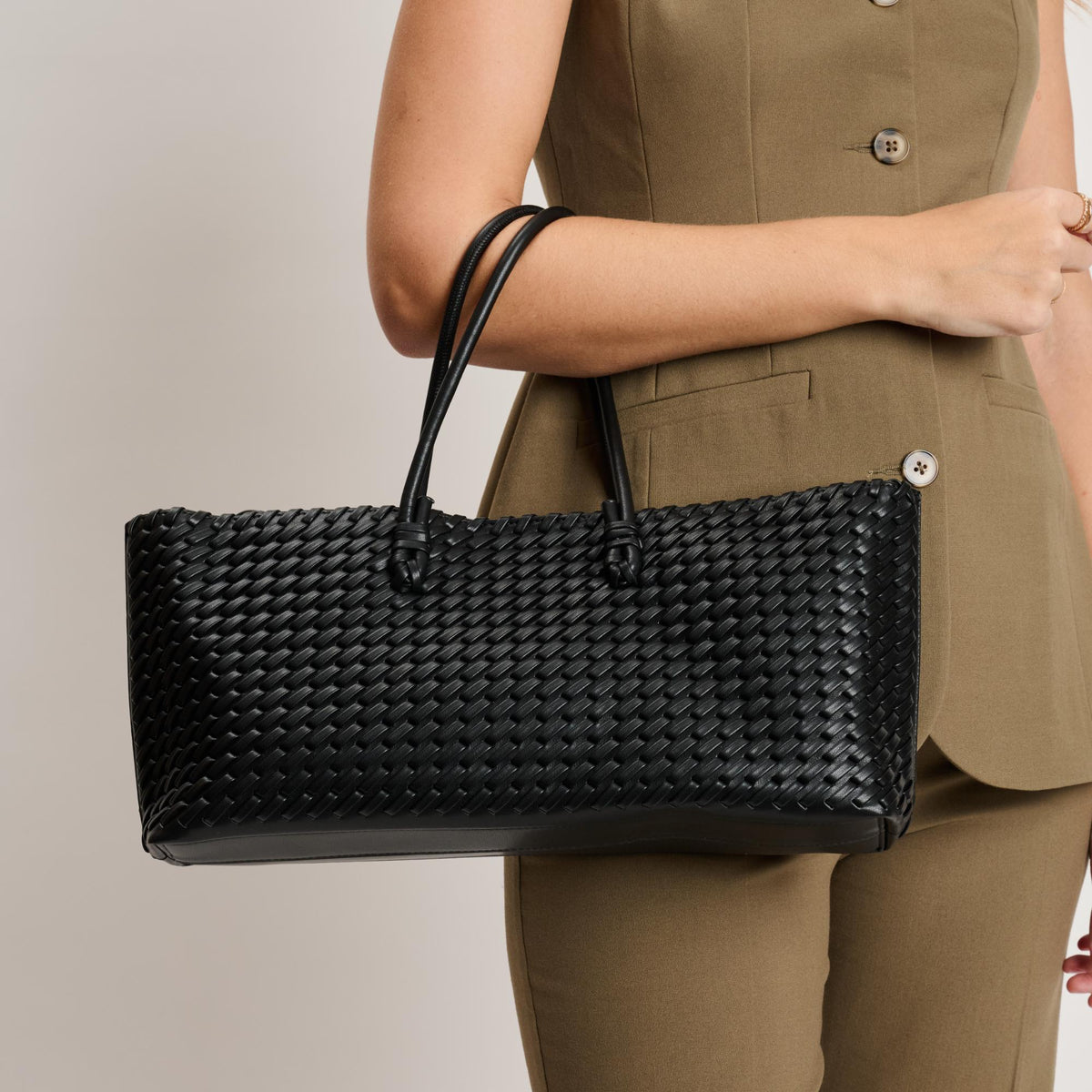 Woman wearing Black Moda Luxe Nola Tote 842017140856 View 1 | Black