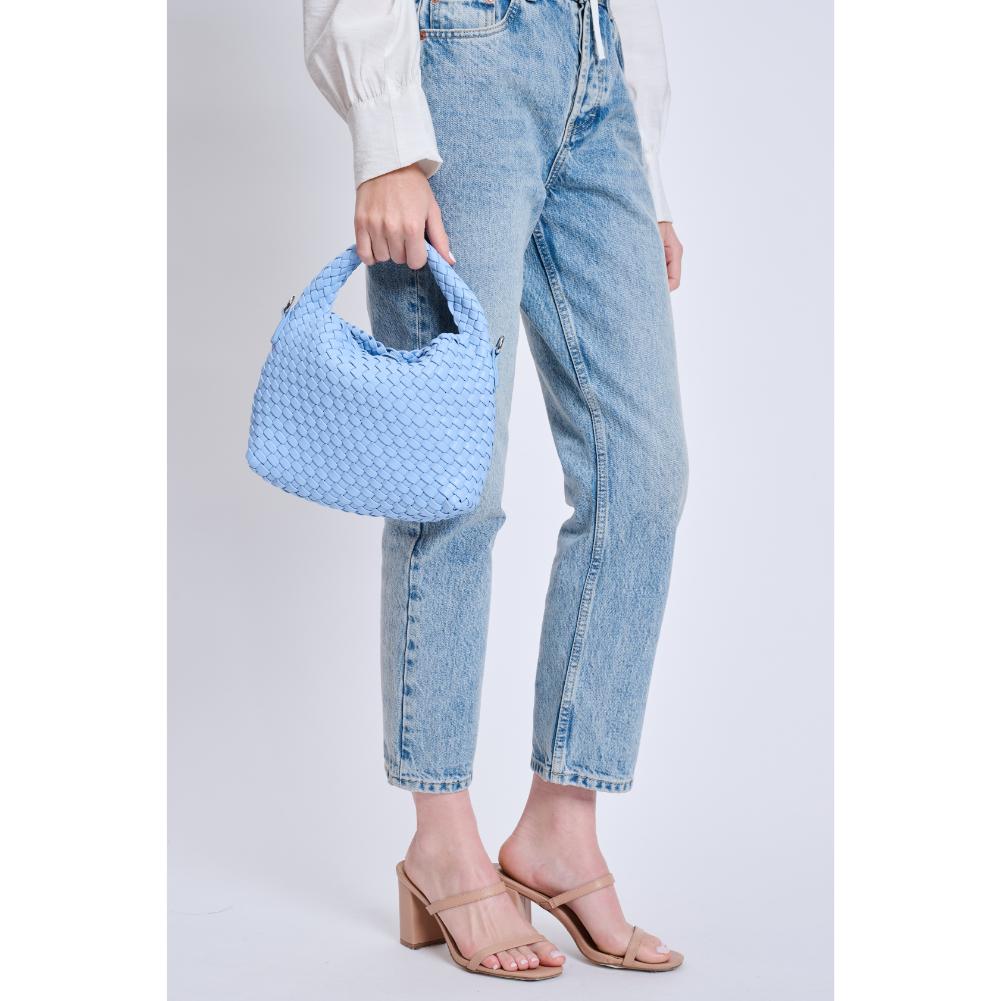 Woman wearing Sky Blue Moda Luxe Jessamine Crossbody 842017132950 View 2 | Sky Blue