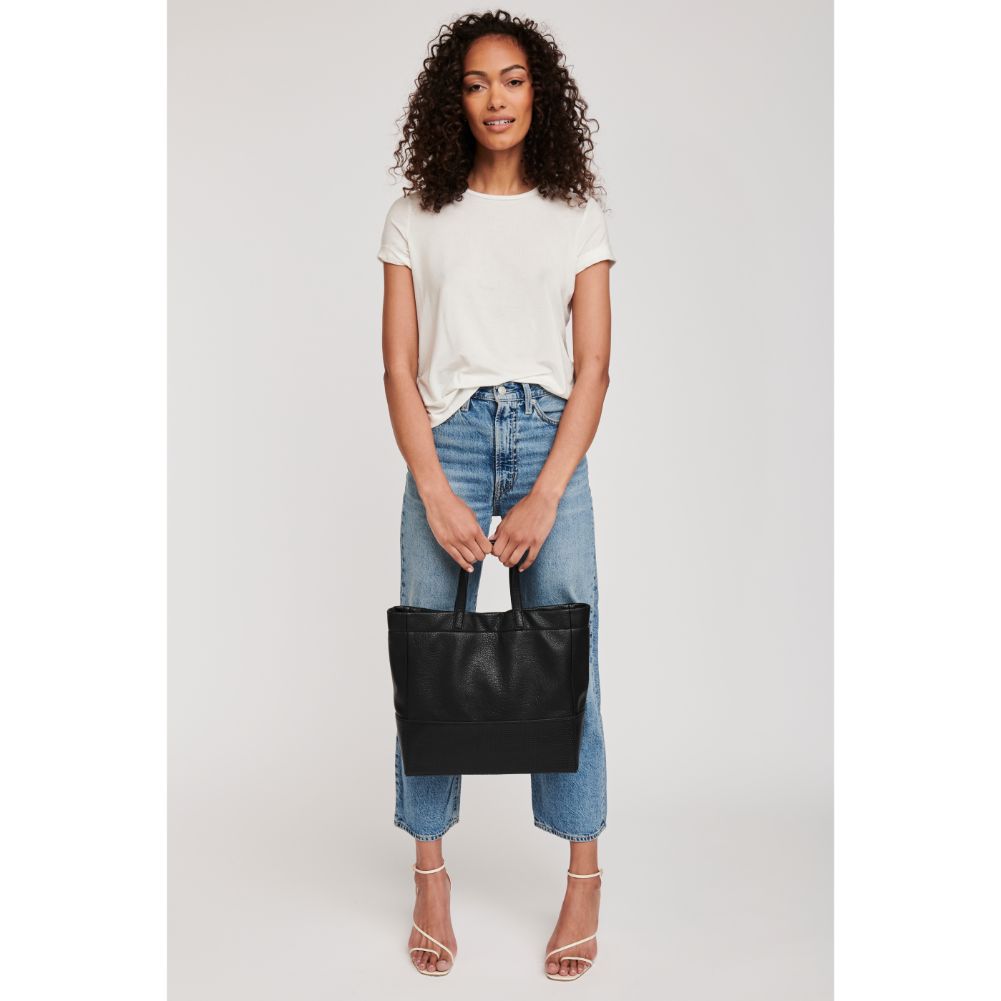 Woman wearing Black Moda Luxe Ingrid Tote 842017125006 View 2 | Black