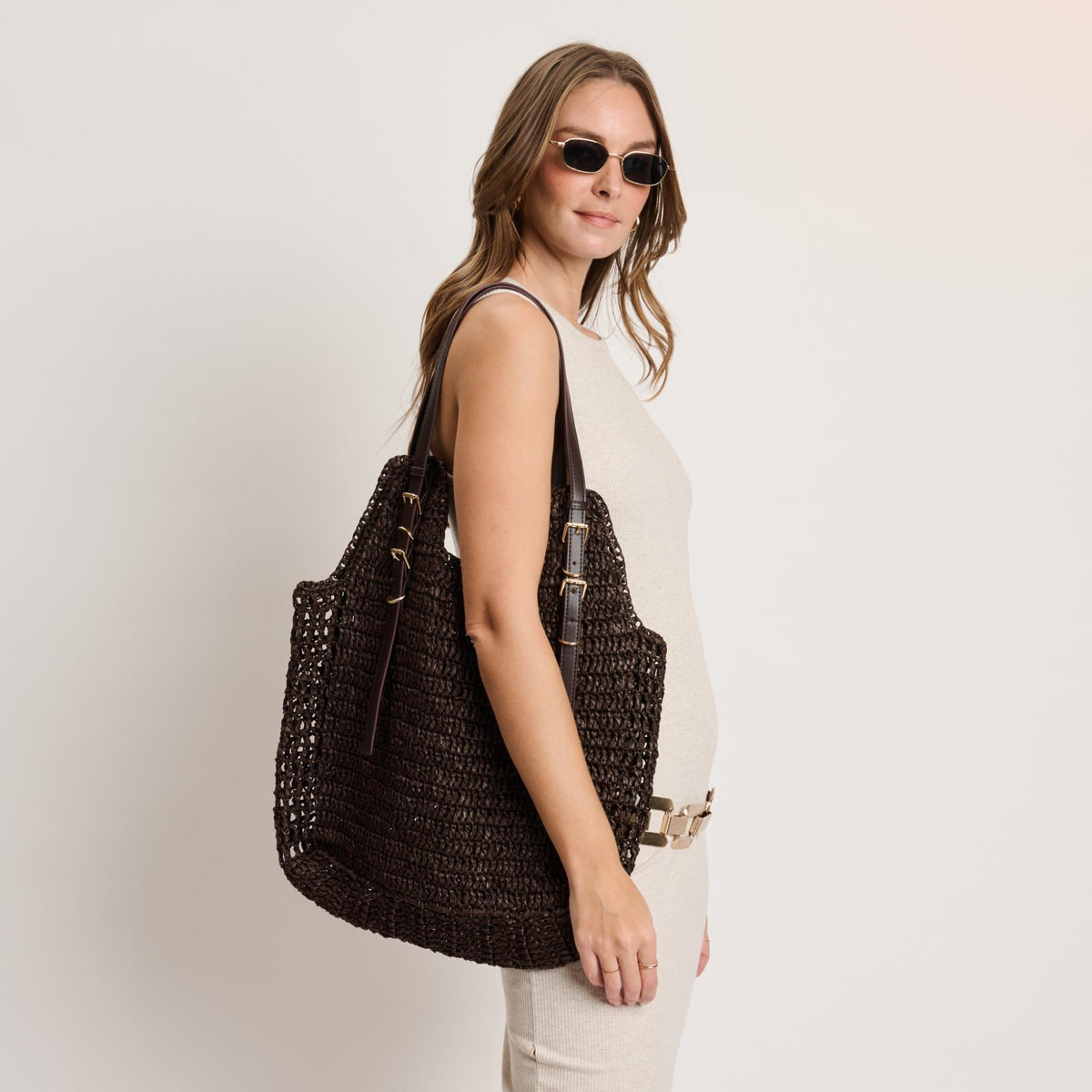 Woman wearing Chocolate Moda Luxe Reina Tote 842017140726 View 1 | Chocolate