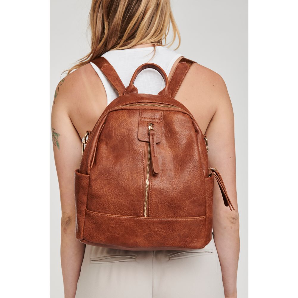 Woman wearing Tan Moda Luxe Bowie Backpack 842017119494 View 1 | Tan