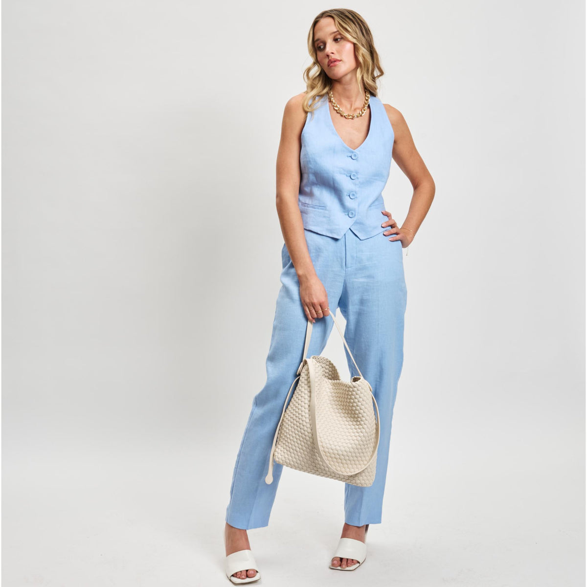 Woman wearing Oatmilk Moda Luxe Edith Hobo 842017137481 View 3 | Oatmilk