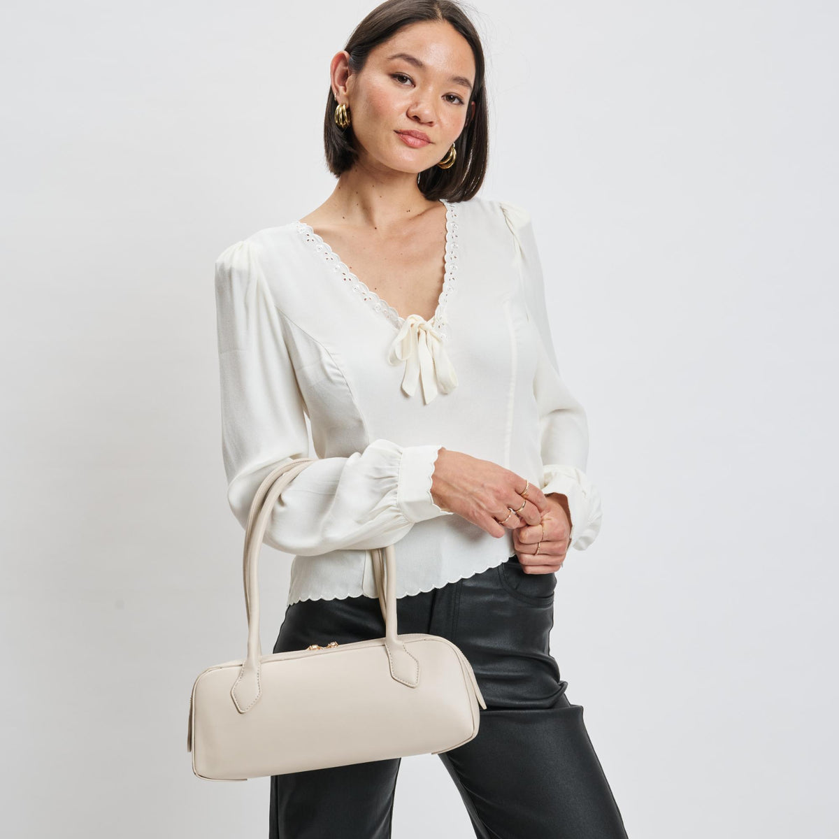 Woman wearing Oatmilk Moda Luxe Betty Shoulder Bag 842017139423 View 1 | Oatmilk