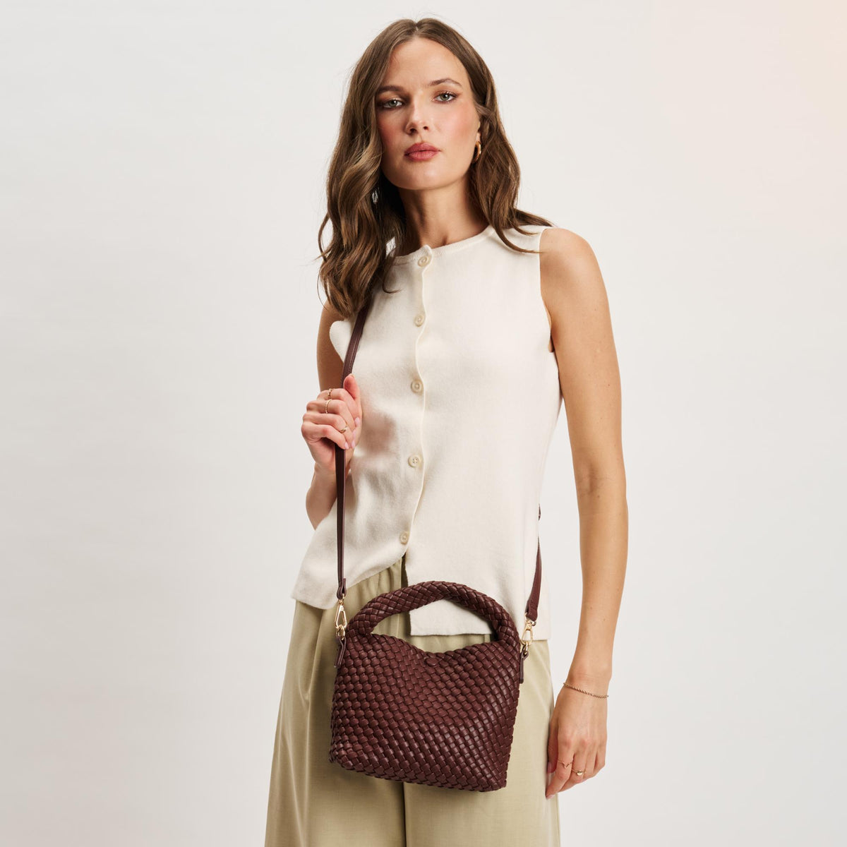 Woman wearing Chocolate Moda Luxe Jessamine Crossbody 842017141327 View 1 | Chocolate