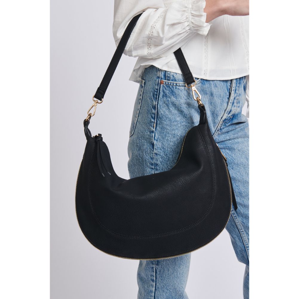 Woman wearing Black Sol and Selene Ruby Hobo 842017129356 View 2 | Black