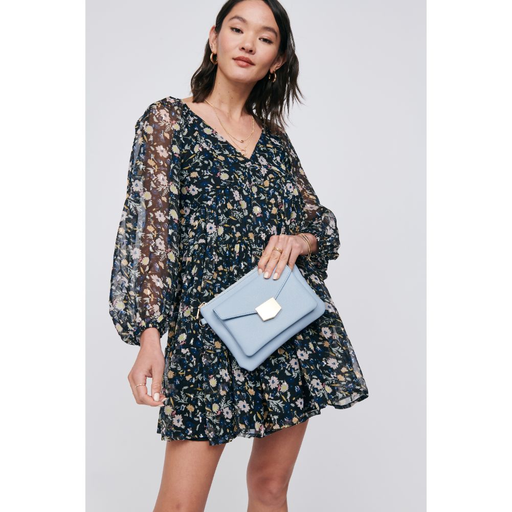 Woman wearing Sky Blue Moda Luxe Amari Crossbody 842017129172 View 2 | Sky Blue