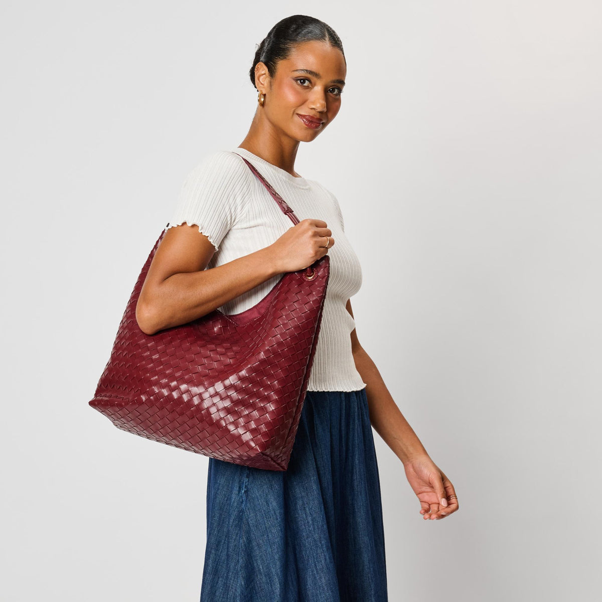 Woman wearing Burgundy Moda Luxe Ezia Hobo 842017142737 View 1 | Burgundy