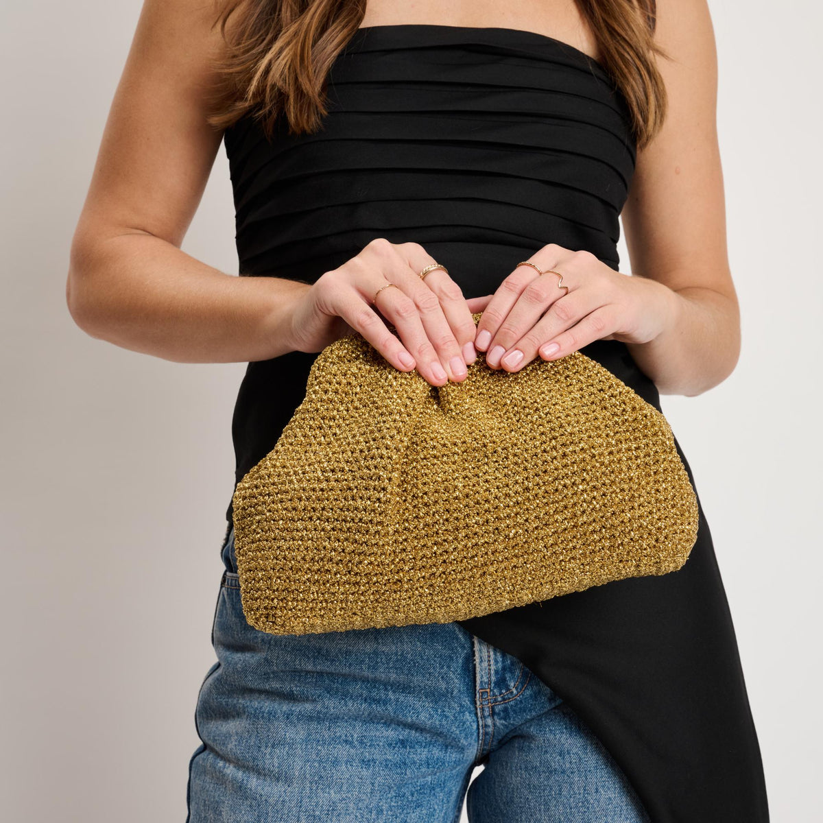 Woman wearing Gold Moda Luxe Amelia Clutch 842017140986 View 1 | Gold