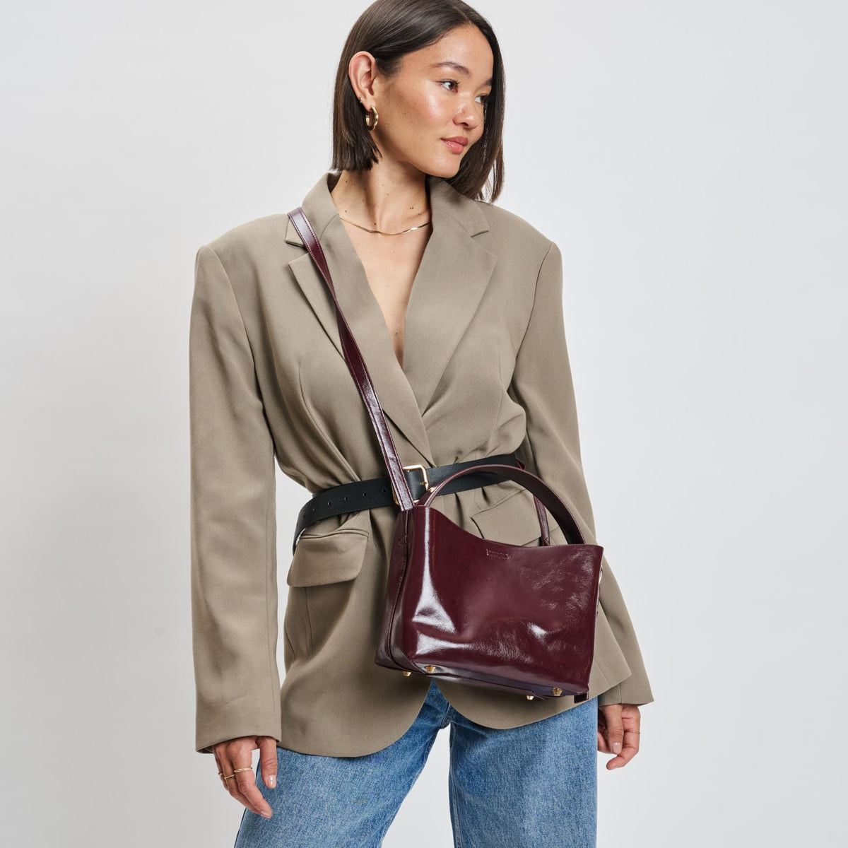 Woman wearing Burgundy Sol and Selene Sophie Crossbody 842017139485 View 3 | Burgundy