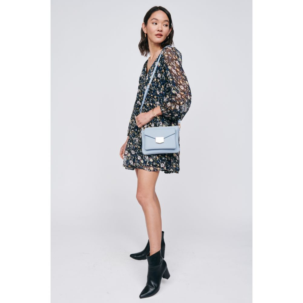Woman wearing Sky Blue Moda Luxe Amari Crossbody 842017129172 View 3 | Sky Blue