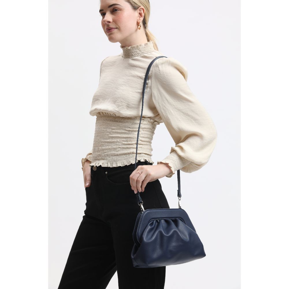 Woman wearing Denim Sol and Selene Charlotte Crossbody 842017134121 View 2 | Denim