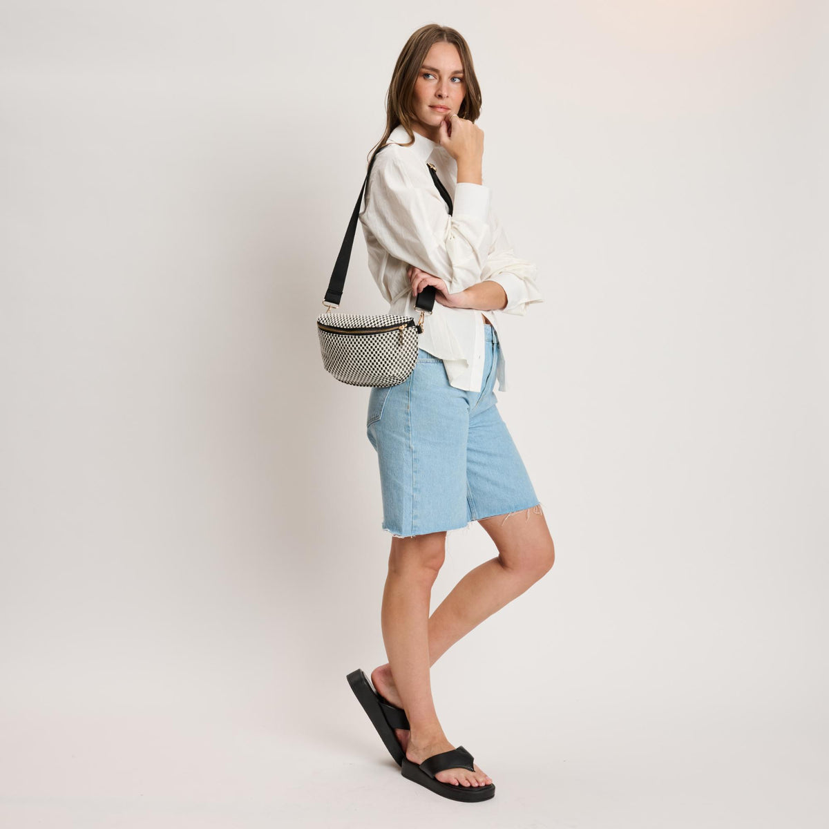 Woman wearing Black White Moda Luxe Gizelle - Small Checker Belt Bag 842017141020 View 4 | Black White