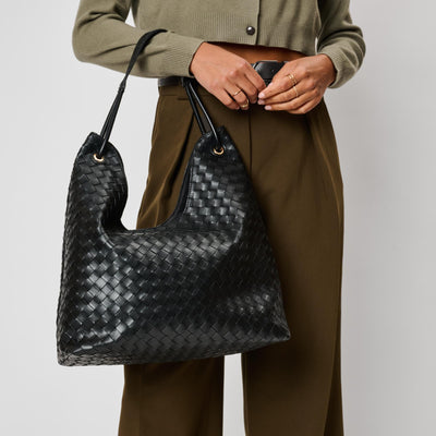 Woman wearing Black Moda Luxe Ezia Hobo 842017142720 View 1 | Black