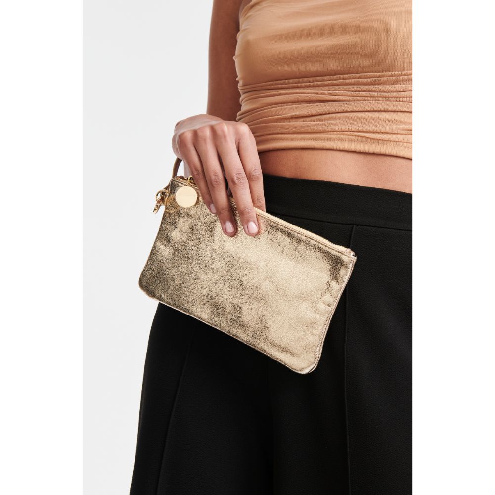 Woman wearing Gold Moda Luxe Olivia Wristlet 842017117933 View 1 | Gold