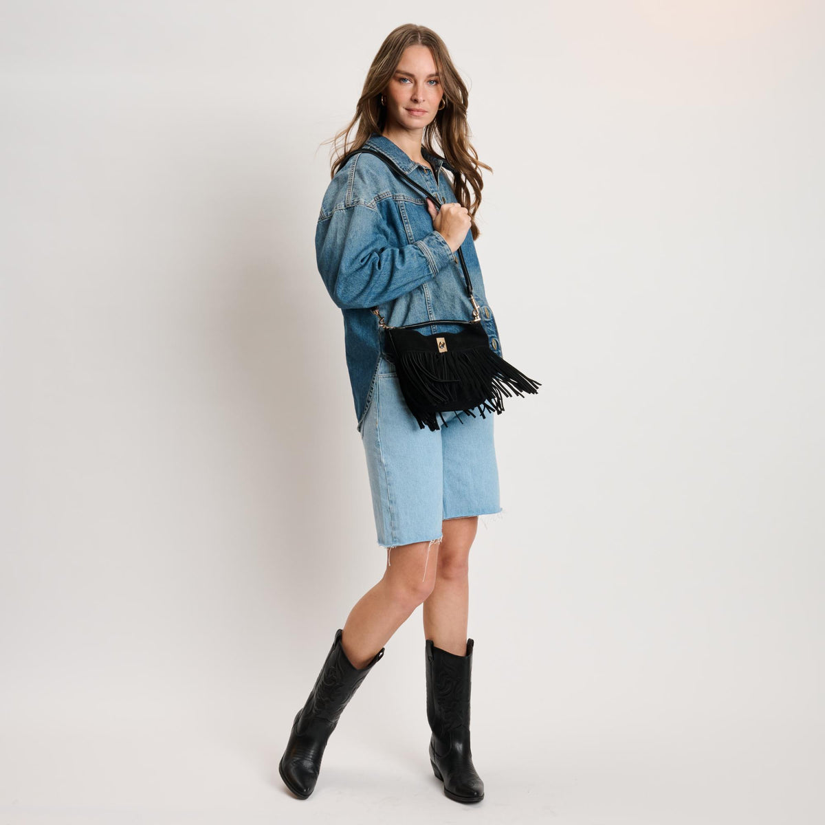 Woman wearing Black Moda Luxe Faith Crossbody 842017139034 View 2 | Black